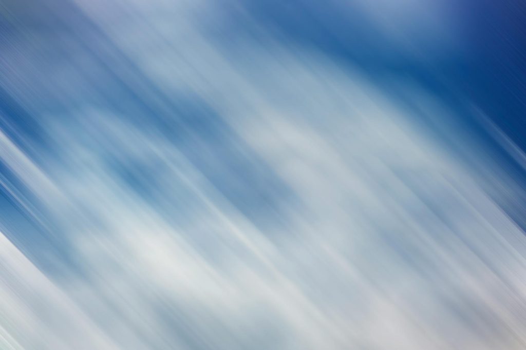 Abstract art with blue and white motion blur, perfect for creative projects and backgrounds.